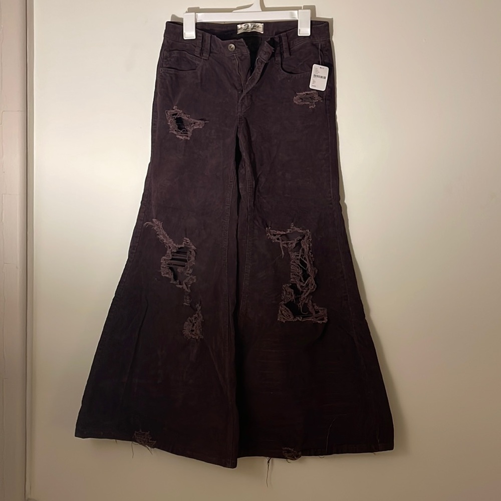Maroon free people distressed corduroy bell bottoms.